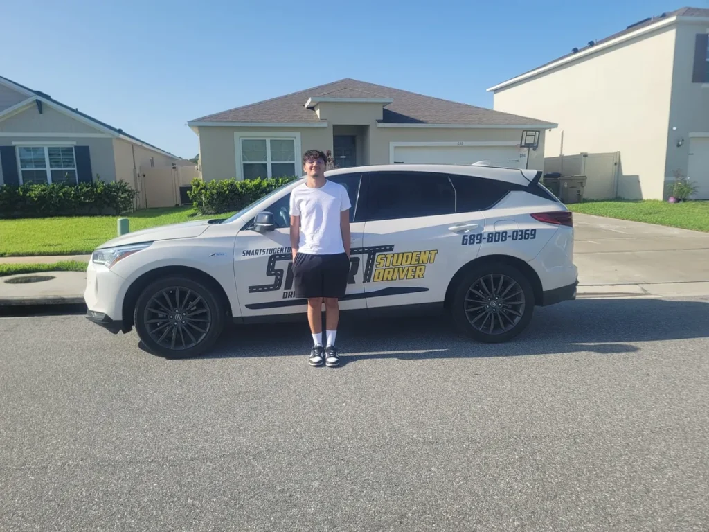 Teenager about to take a driving lesson